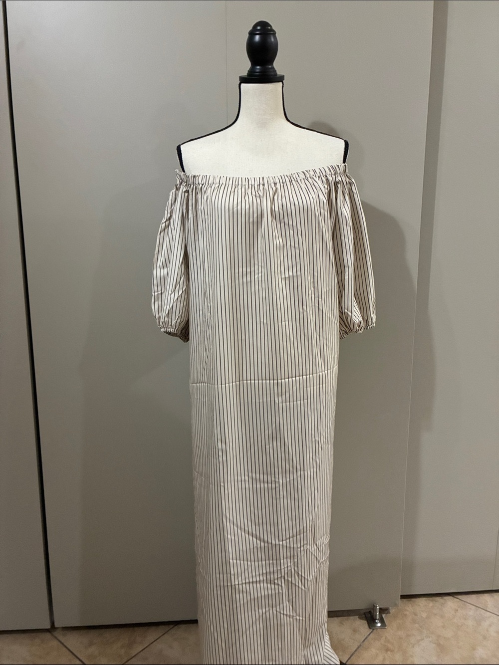 Off-Shoulder Cream and Black Pinstripe Maxi Dress